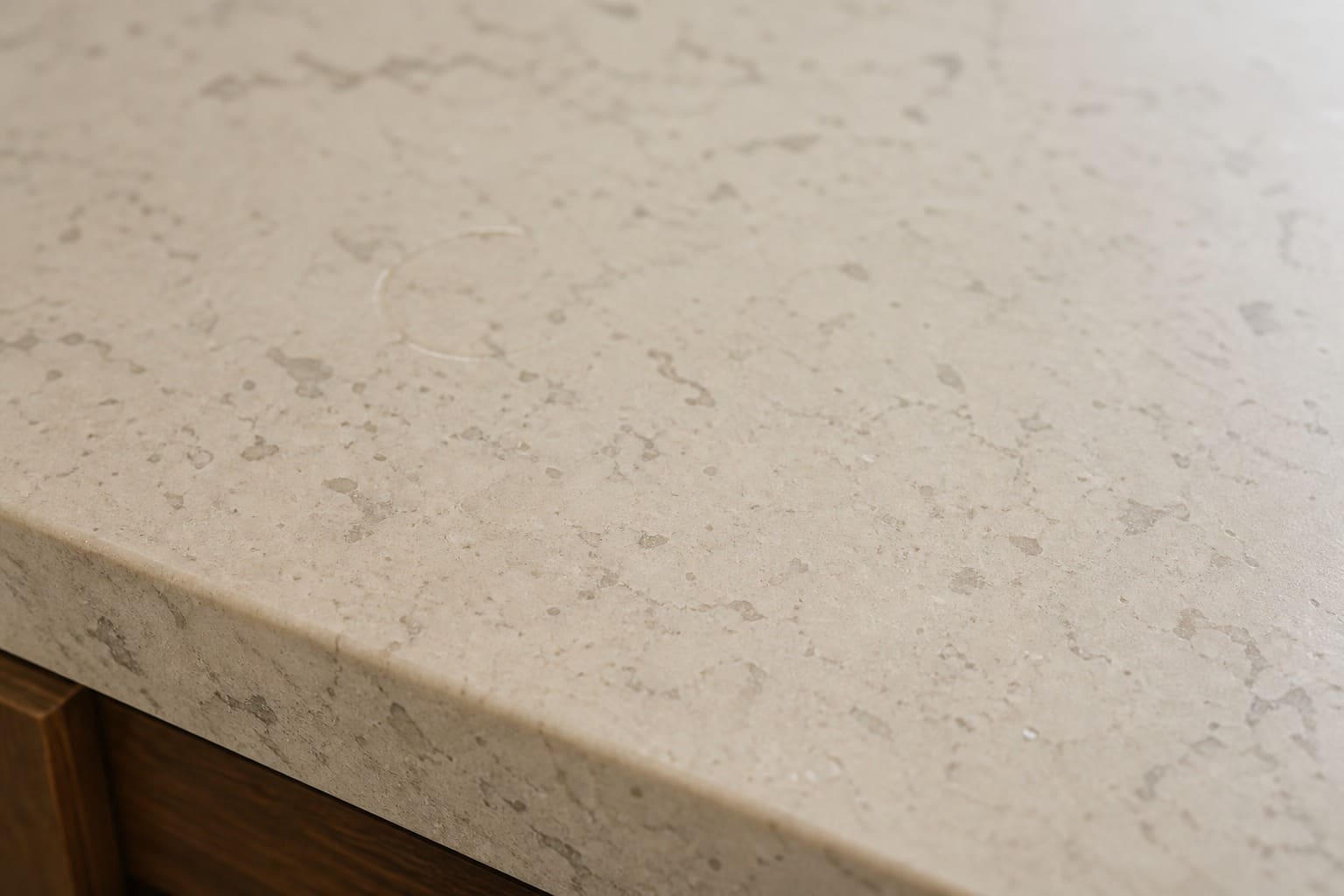Warm quartz kitchen countertop in a Campbell home where a Sub-Zero built-in is installed